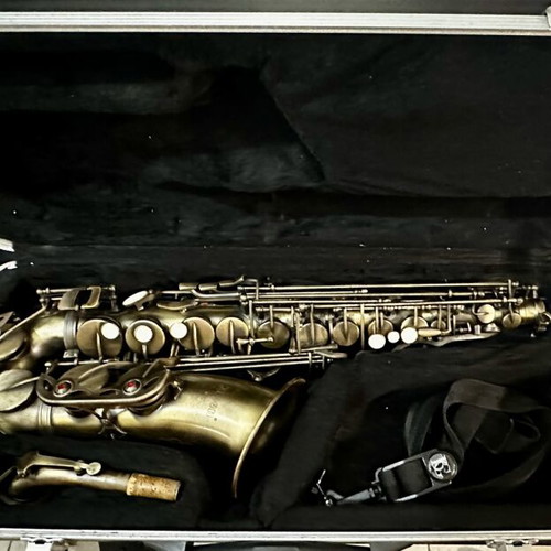 Alto saxophone used, with case