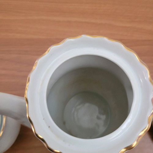 Porcelain tea set used with minor damages