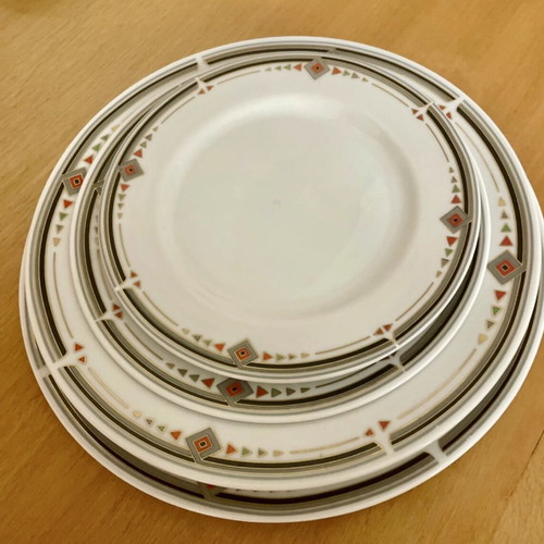 Vintage Epiag porcelain set of four plates like new