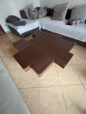 Wooden coffee table like new, dark brown with glass legs