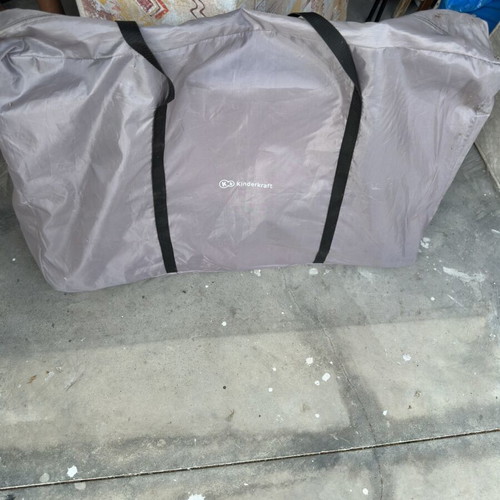 Kinderkraft Neste Up baby cot used with mattress and carrying bag