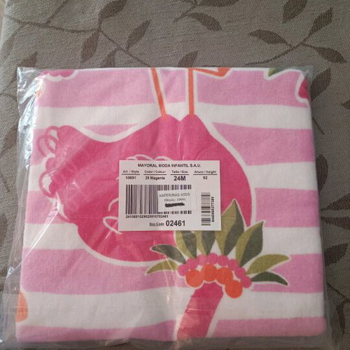 Branded poncho towel new in its packaging