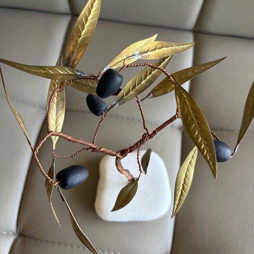 Handmade olive decoration on marble base used