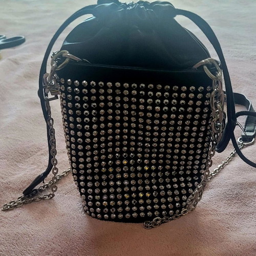 Shoulder bag like new, small black with shiny silver ornaments