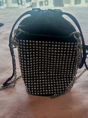 Shoulder bag like new, small black with shiny silver ornaments