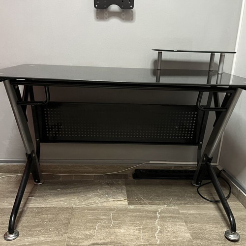 Glass desk used with metal frame, modern design