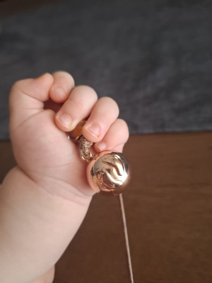 Pregnancy pendant proud mama with brown cord and gold bead, like new