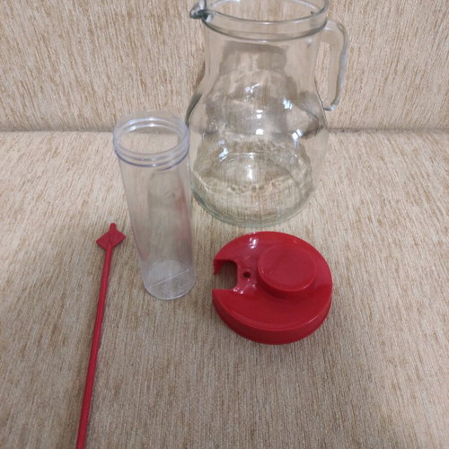 Glass pitcher large like new with ice compartment and stirrer