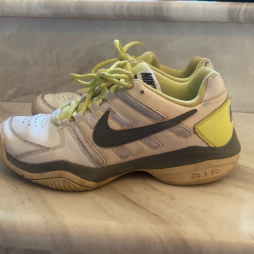 Nike athletic shoes used, white yellow, size 38