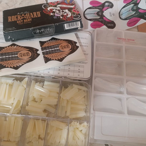 Nail art kit with tips, stamping plates and accessories