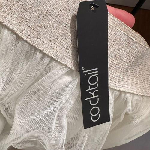Skirt beige new with three layers of tulle and lining, size S