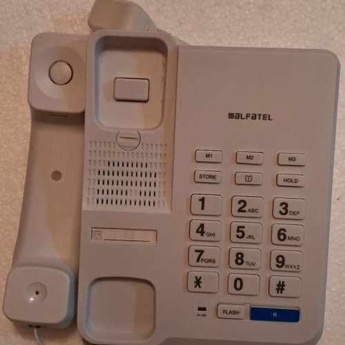Landline phone with large buttons like new, white, wired