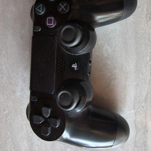 PS4 Slim 1TB console used with 3 games and 1 controller