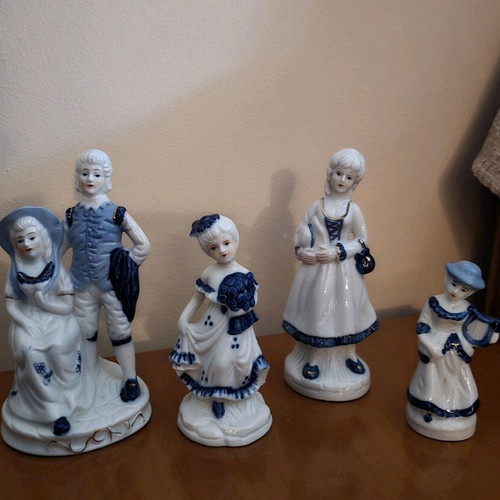 Porcelain decorative figures like new, set of four