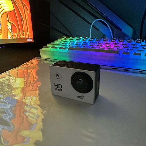 HD 1080P camera with charging cable and tripod case