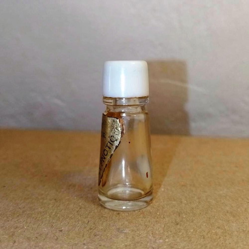 Hypnotique miniature bottle by Max Factor used, collectible