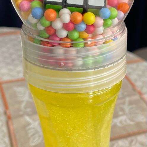 Slap toy yellow with Rubik's cube new