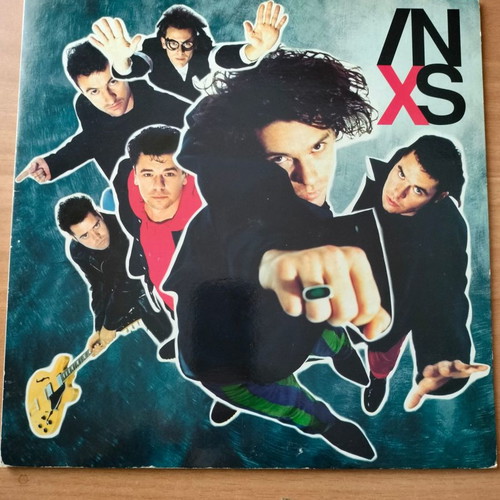 In XS vinyl record in excellent condition