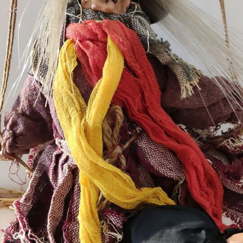 Witch figure used with sound and light-up hair