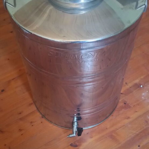 Stainless steel container 100 liters like new with tap and base