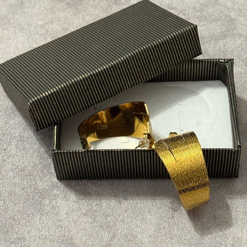 Earrings made of stainless steel gold color new with embossed designs