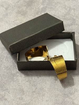Earrings made of stainless steel gold color new with embossed designs
