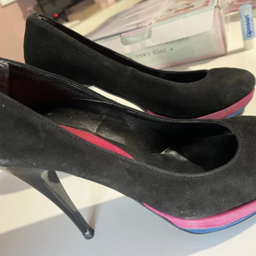 Castor pumps with 3 cm platform and 12 cm heel like new