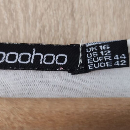 Boohoo white blouse used with sun and moon graphics on sleeves