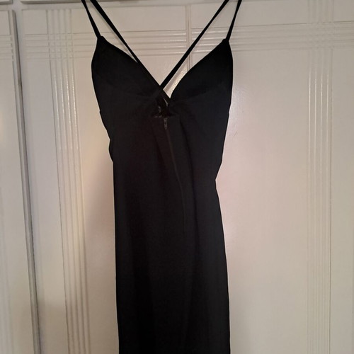 Black mini dress tight with nice back like new