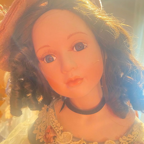 Porcelain doll like new from collection