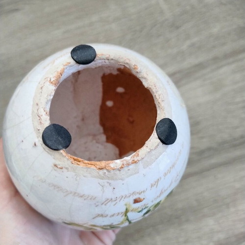 Ceramic decorative item with decoupage technique used