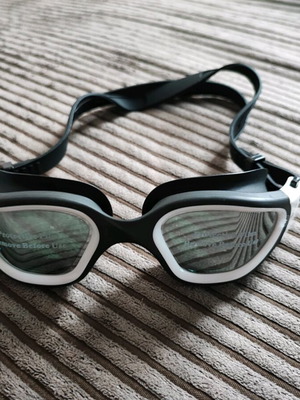 White swimming goggles new