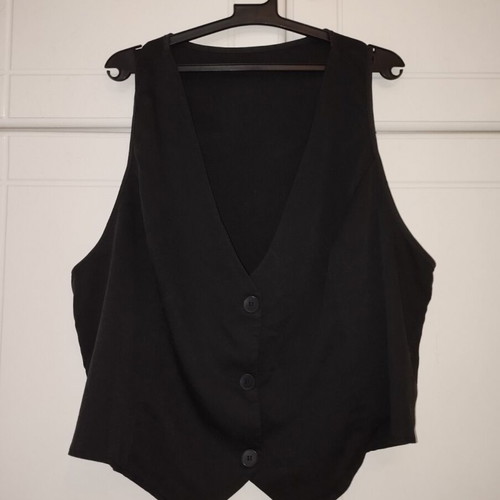 Women's black suit vest used