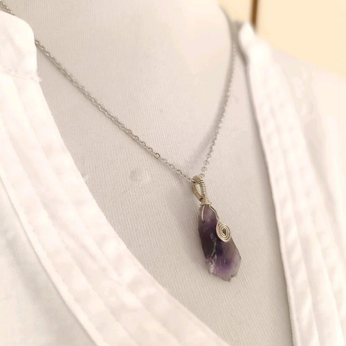 Amethyst wire-wrapped pendant on steel chain
