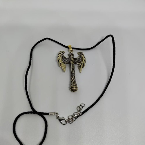 Pendant Double Axe like new, gold-colored steel with black cord