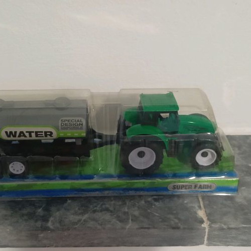 Toy tractor used, plastic, like new in box