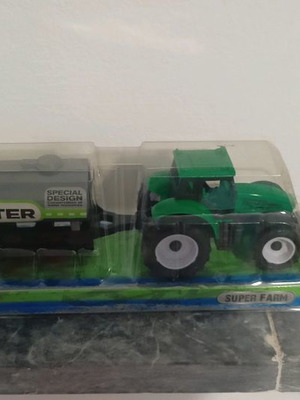 Toy tractor used, plastic, like new in box