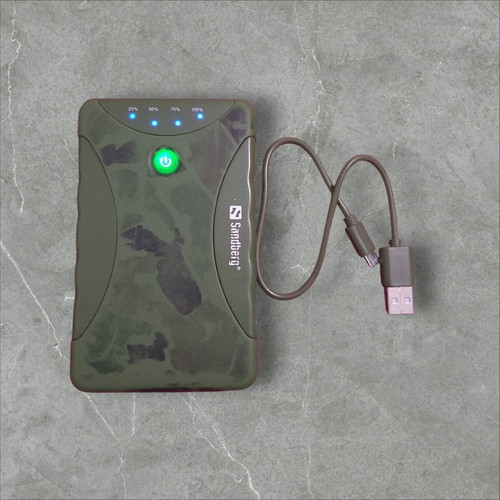 Powerbank 10400mAh with dual charging ports, built-in flashlight, and cable like new