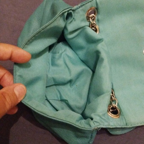 Green shoulder bag with flower