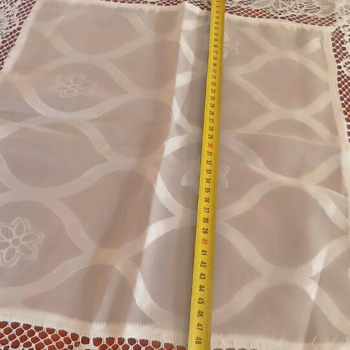 Set of 4 table linens like new, 2 squares 56x56 and 2 36x36