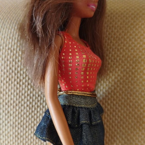 Barbie doll by Mattel like new with denim skirt and gold details