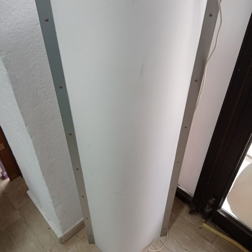 Slamp floor lamp used with woman design