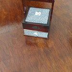 Decorative box used with cherry wood and porcelain