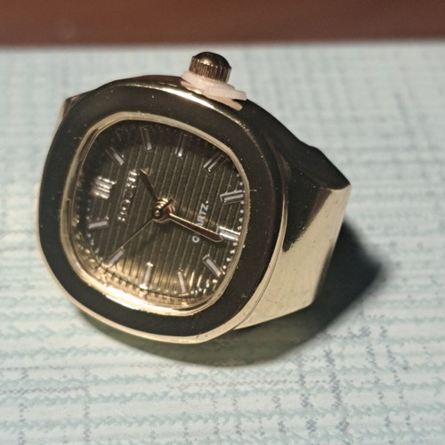 Ring watch with khaki dial and gold bracelet