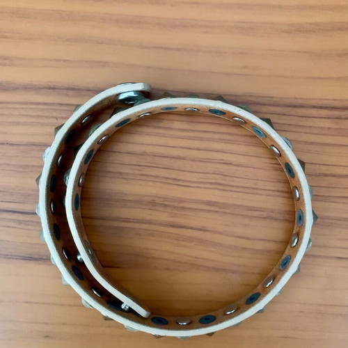 Bracelet with studs and transparent stones like new, beige and silver