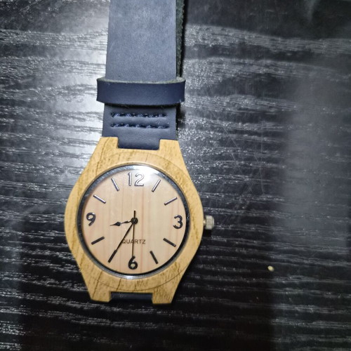 Unisex watch with wooden dial and blue leather strap