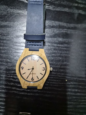 Unisex watch with wooden dial and blue leather strap