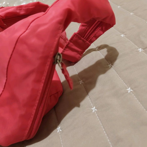 Nylon handbag like new, pink fluo with 3 compartments