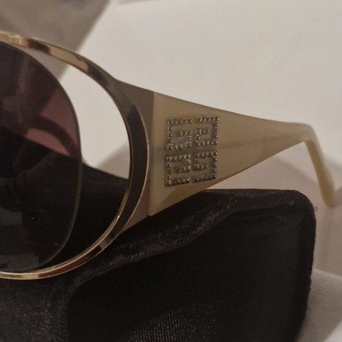 Givenchy sunglasses used, gold color