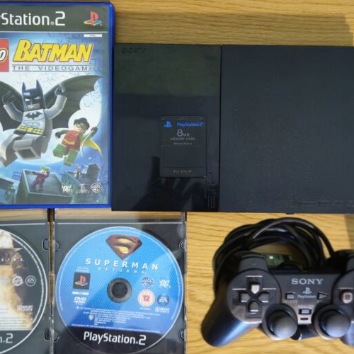 Sony PlayStation 2 Slim 9000X console bundle with 5 games, controller, memory card, cables